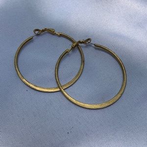 Large gold hoop earrings